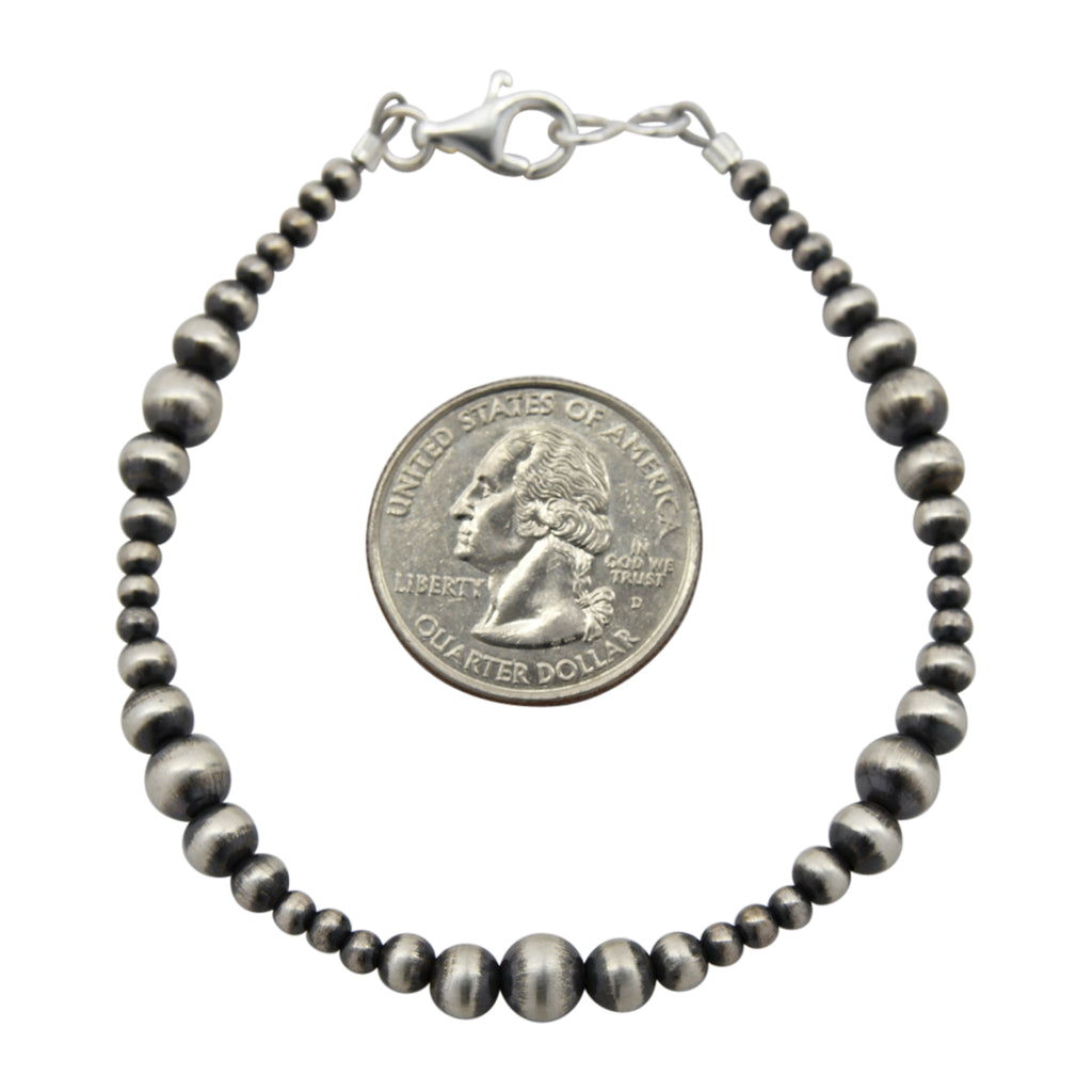Sterling Silver Mixed Graduated Navajo Pearl Oxidize Bead Bracelet. Available in 7" to 10"